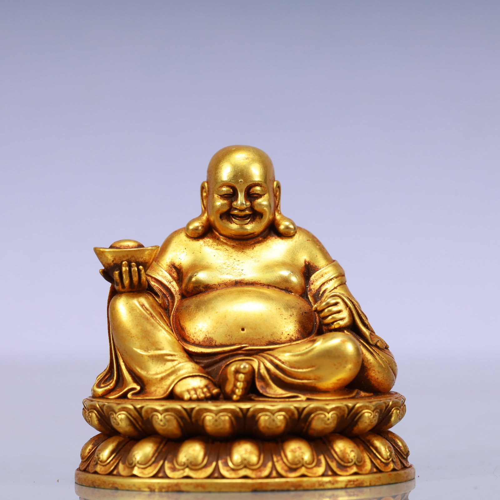An Exquisite Gilt Bronze Statue of Maitreya Buddha: An Exquisite Gilt Bronze Statue of Maitreya Buddha Ming Dynasty, China Yongle Six-character Mark Size:2.8inx2.2inx2.6in Weight:708g铜鎏金弥勒佛像