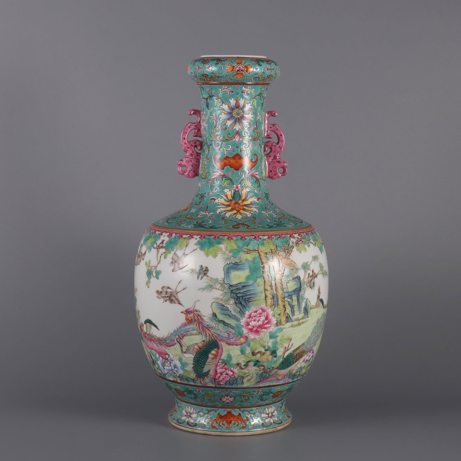 A Rare Famille-Rose Lotus Pattern Flower and Bird Pattern Double-Ears Vase: A Rare Famille-Rose Lotus Pattern Flower and Bird Pattern Double-Ears Vase Qing Dynasty, China Qianlong Six-character MarkSize:13.7inx6.9in粉彩缠枝莲纹花Ɣ