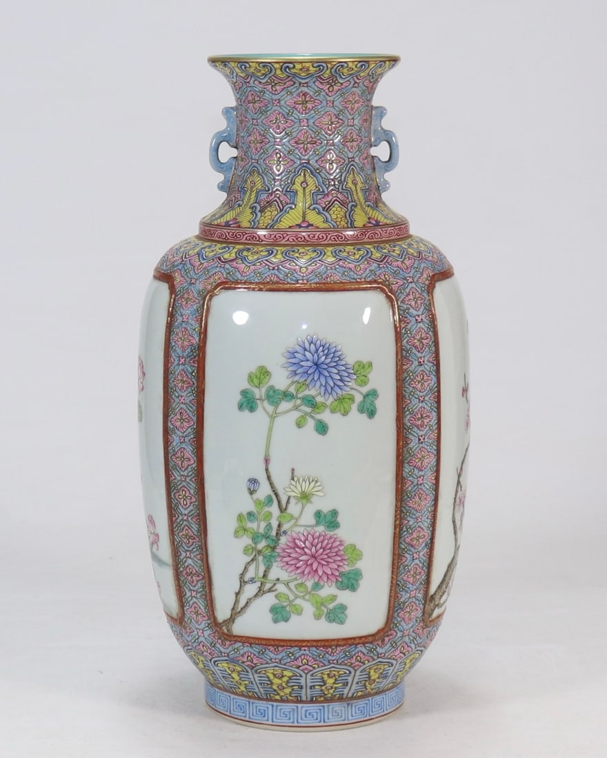 A Rare Famille-Rose Painted Gold Flower Pattern Double-Ears Vase: A Rare Famille-Rose Painted Gold Flower Pattern Double-Ears Vase,Qing Dynasty,China,Qianlong Six-character Mark,Size:13inx3.7in粉彩描金花卉纹双耳&