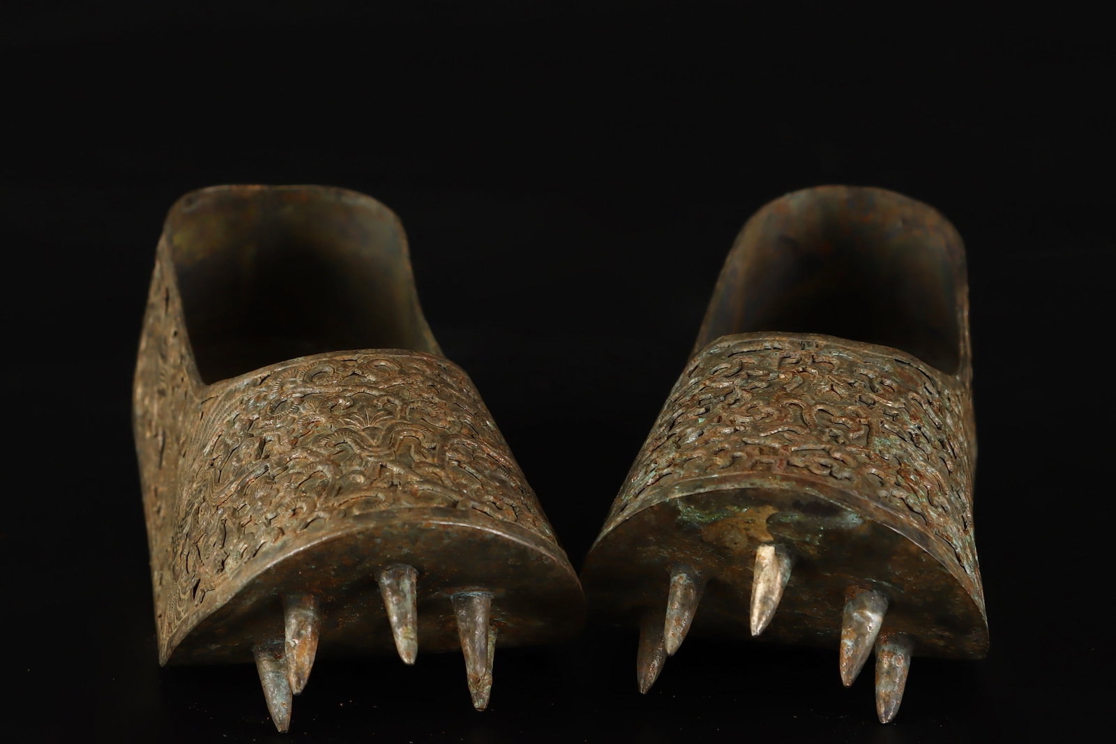 A Pair of Exquisite Bronze Shoes: A Pair of Exquisite Bronze Shoes,Tang Dynasty,China,Size:1.8inx4.7inx2in,Weight:152g一对铜鞋子,中国唐代,Size:4.5cmx12cmx5cm,Weight:152g
