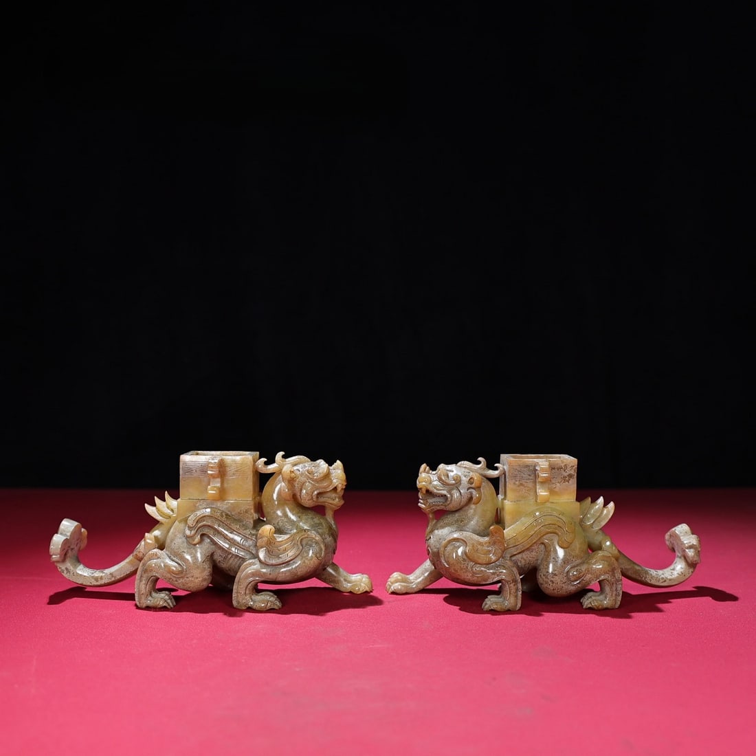 A Pair of Exquisite White Jade Auspicious Beast Ornaments: A Pair of Exquisite White Jade Auspicious Beast Ornaments,Qing Dynasty,China,Size:6.9inx2.1inx3in,Total Weight:998g一对白玉瑞兽摆件,中国