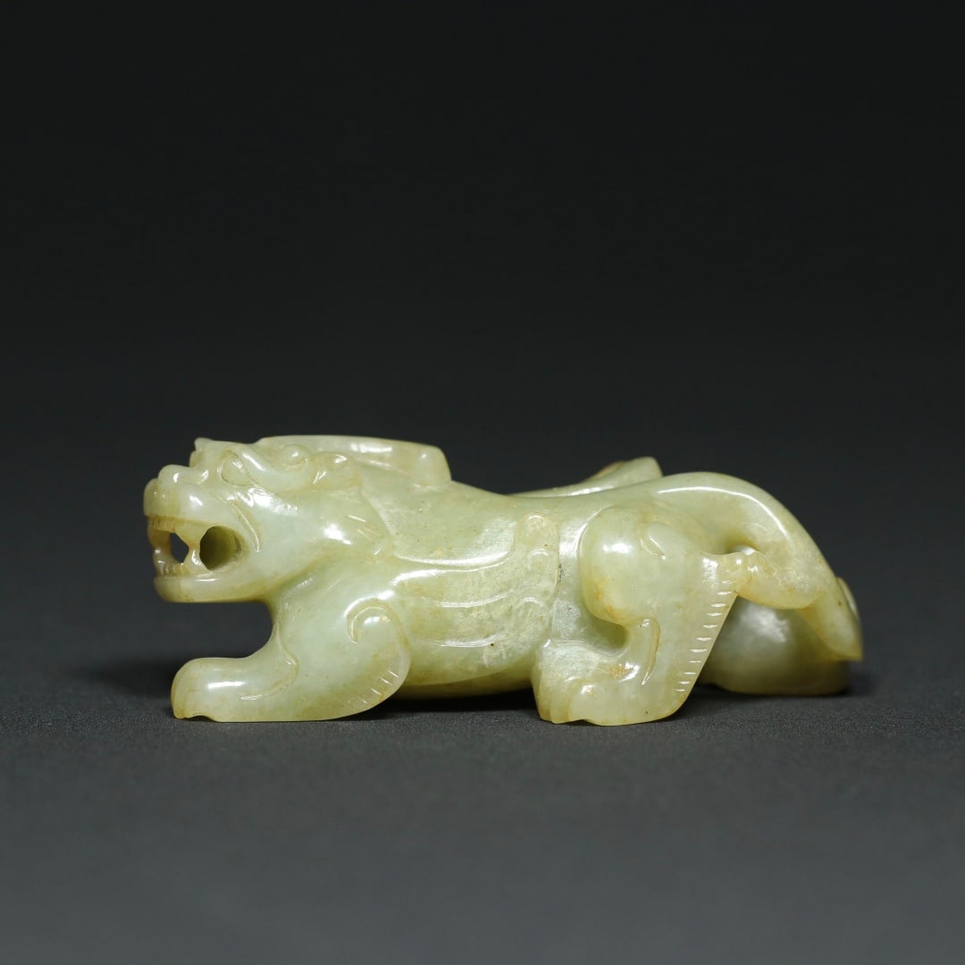 An Exquisite White Jade Auspicious Beast Ornament: An Exquisite White Jade Auspicious Beast Ornament,Han