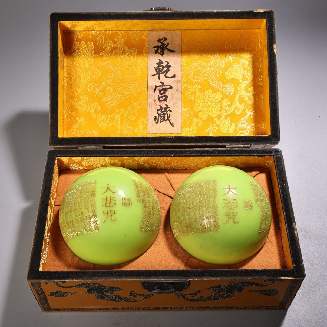 A Pair of Exquisite Painted Gold Inscription Luminous Pearl Ornaments: A Pair of Exquisite Painted Gold Inscription Luminous Pearl Ornaments,Qing Dynasty, China,Size:3.9in,Total Weight:2900g一对描金经文夜明珠摆&