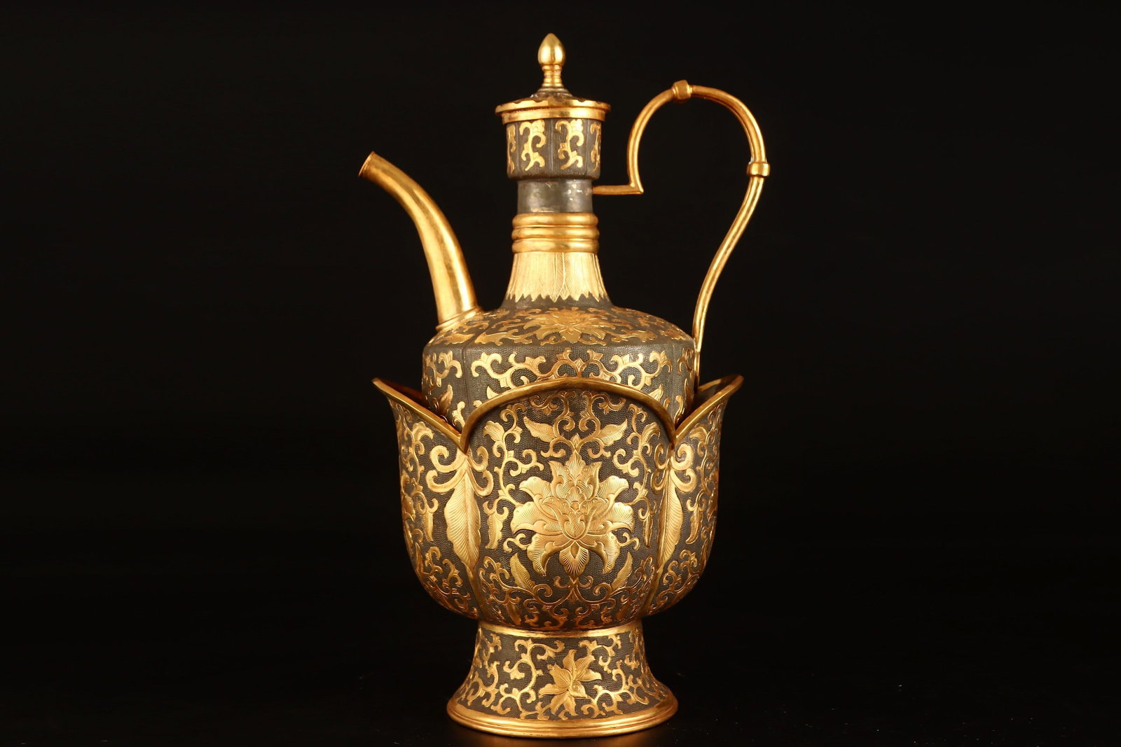 A Rare Gilt Bronze Lotus Pattern Ewer: A Rare Gilt Bronze Lotus Pattern Ewer,Tang Dynasty,China,Size:13.4inx7.5in,Weight:1776g铜鎏金缠枝莲纹执壶,中国唐代,Size:34