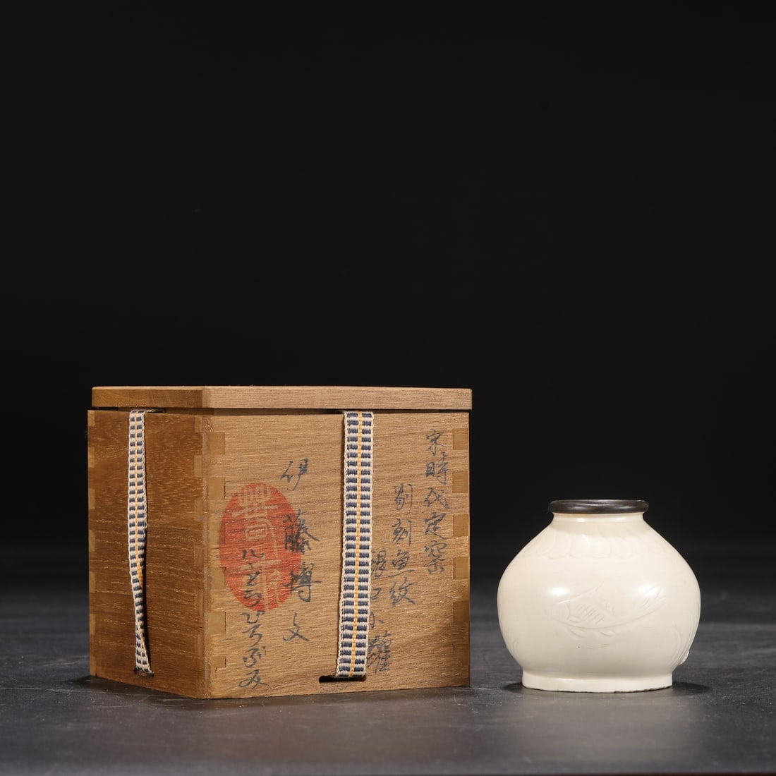 An Exquisite Ding yao Fish and Lotus Pattern Jar: An Exquisite Ding yao Fish and Lotus Pattern Jar Song Dynasty, China Size:2.9inx3.1in定窑剔刻鱼藻纹银口小罐
