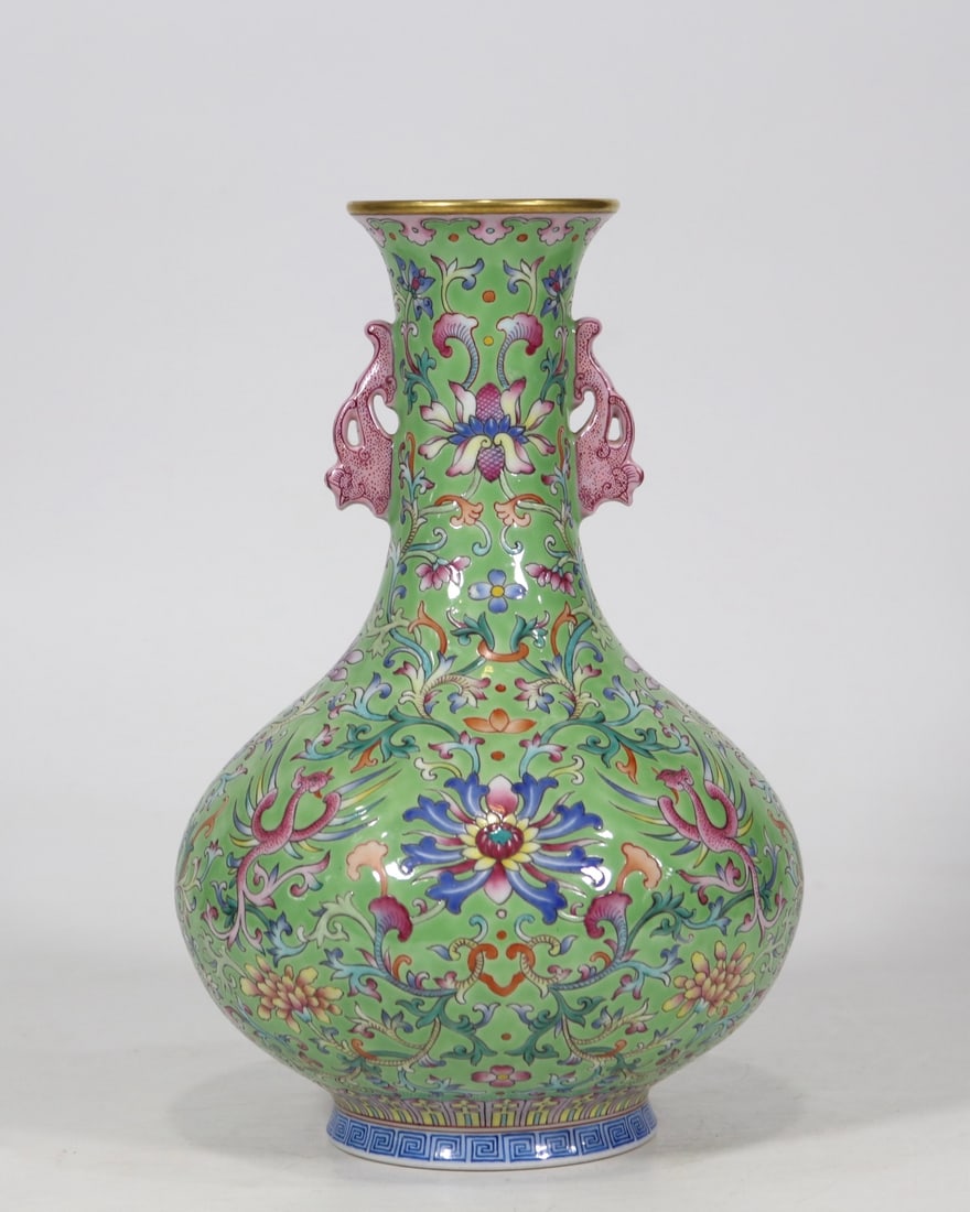 An Exquisite Green Ground Famille-Rose Painted Gold Lotus and Phoenix Pattern Double-Ears Vase: An Exquisite Green Ground Famille-Rose Painted Gold Lotus and Phoenix Pattern Double-Ears Vase,Qing Dynasty,China,Jiaqing Six-character Mark,Size:11inx7.1in绿地粉彩描%