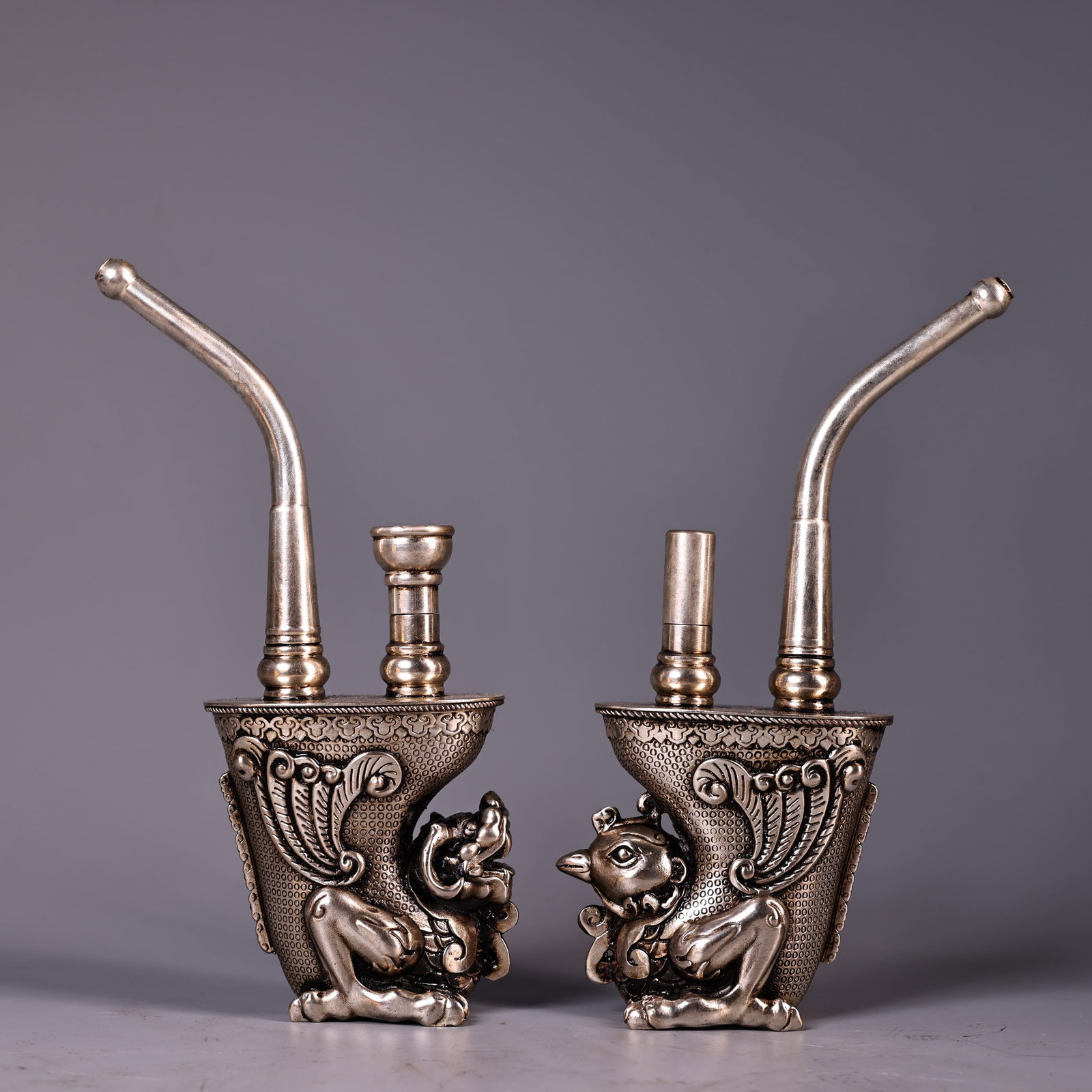 A Pair of Exquisite Bronze Dragon and Phoenix-Shaped Ornaments: A Pair of Exquisite Bronze Dragon and Phoenix-Shaped Ornaments,Qing Dynasty, China,Qianlong Four-character Mark,Size:7.5inx2.8in,Total