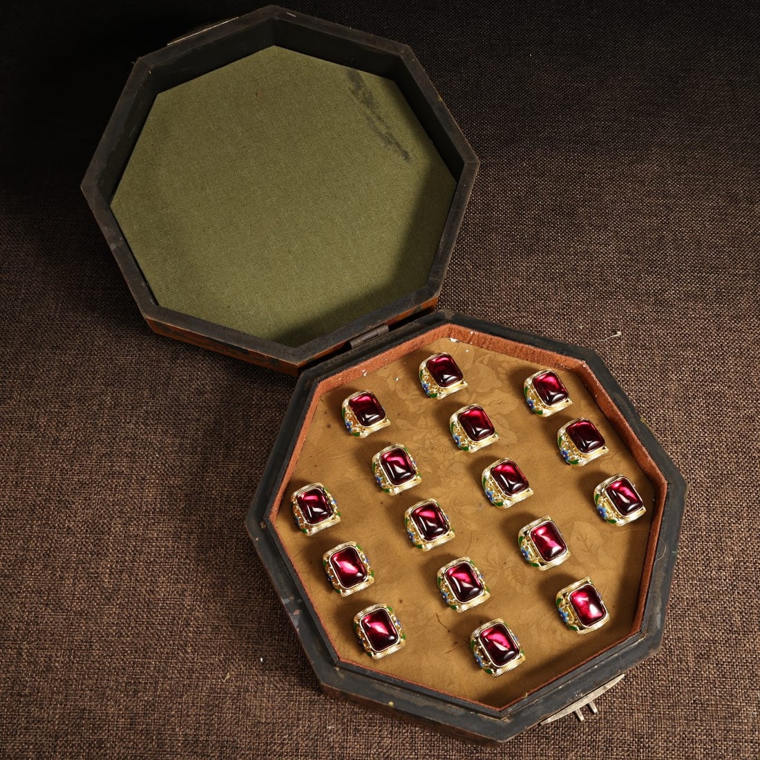 A Set of Fine Gilt Bronze Inlaid Ruby Rings: A Set of Fine Gilt Bronze Inlaid Ruby Rings,Qing Dynasty, China,Qianlong Four-character Mark,Size:(Box)9.4inx5.9in,(Ring)0.8inx7.5inx5.5in,Total