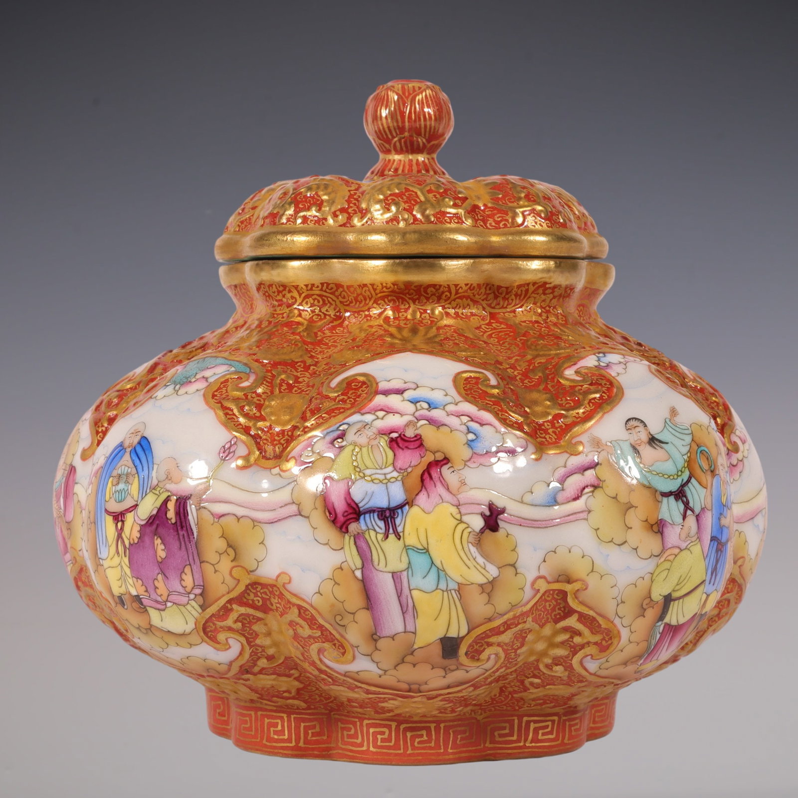 An Exquisite Enamel Iron-Red Painted Gold Character and Story Pattern Tea Caddy: An Exquisite Enamel Iron-Red Painted Gold Character and Story Pattern Tea Caddy Qing Dynasty, China Qianlong Six-character Mark Size:4.7inx4.7in珐琅彩雕刻矾红