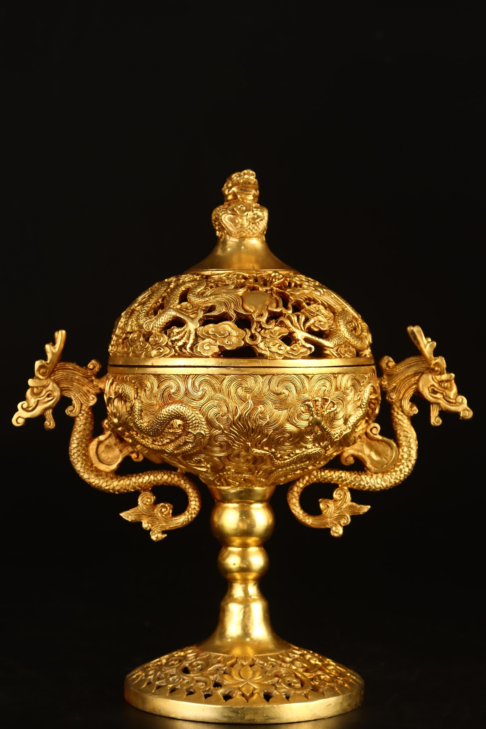 An Exquisite Gilt Bronze Hollow Auspicious Cloud and Dragon Pattern Dragon-Ears Censer: An Exquisite Gilt Bronze Hollow Auspicious Cloud and Dragon Pattern Dragon-Ears Censer,Qing Dynasty,China,Size:9.8inx8.5in,Weight:1548g铜鎏金镂空祥云龙&