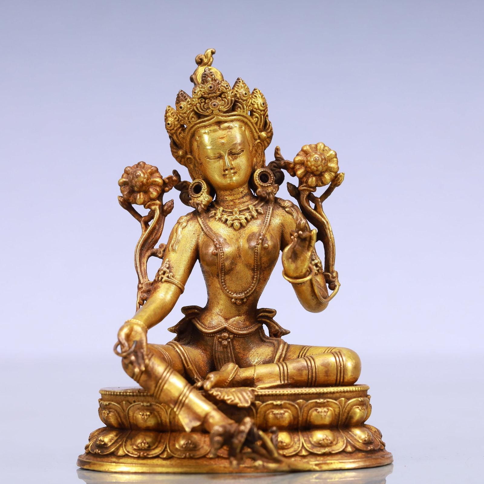 An Exquisite Gilt Bronze Statue of Tara: An Exquisite Gilt Bronze Statue of Tara Ming Dynasty, China Size:3.1inx2.8inx4.1in Weight:354g铜鎏金度母佛像 中国明代 Size:8cmx7cmx10.