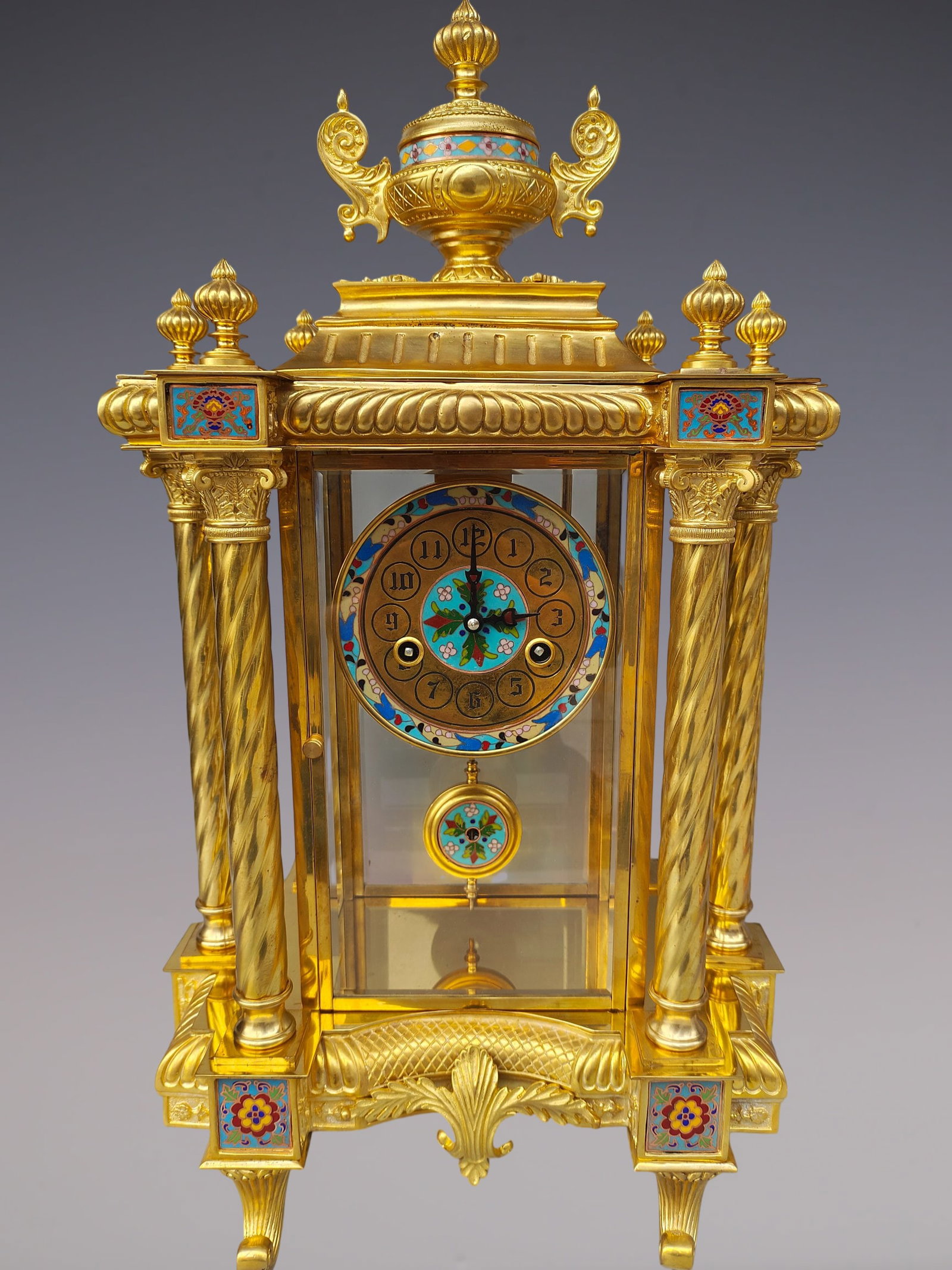 An Exquisite Gilt Bronze Lotus Pattern Clock: An Exquisite Gilt Bronze Lotus Pattern Clock Size:14.2inx9.4inx23.6in铜鎏金缠枝莲纹钟表 Size:36cmx24cmx60cm