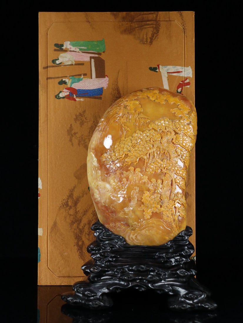 An Exquisite Tianhuang Stone Landscape and Figure Pattern Ornament: An Exquisite Tianhuang Stone Landscape and Figure Pattern Ornament,Qing Dynasty, China,Size:11inx7.9inx4.3in,Weight:3125.9g田黄石山水人物纹摆Ê