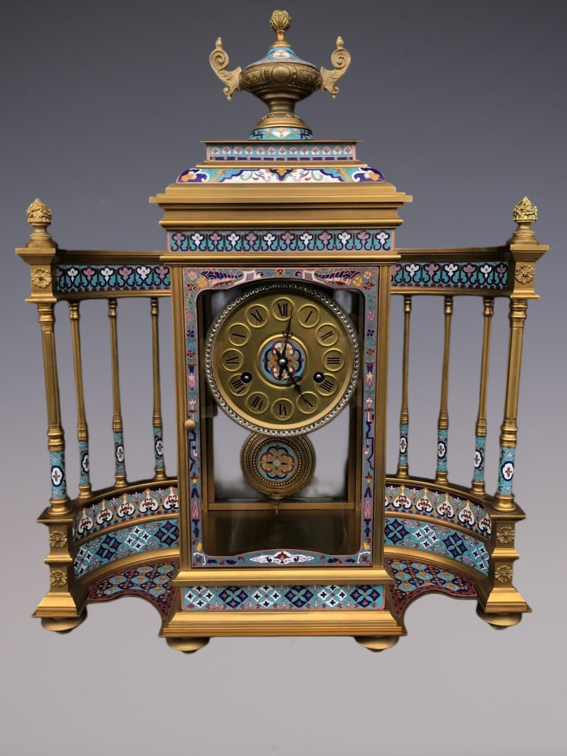 An Exquisite Gilt Bronze Lotus Pattern Clock: An Exquisite Gilt Bronze Lotus Pattern Clock Size:18.1inx5.9inx21.7in铜鎏金缠枝莲纹钟表 Size:46cmx15cmx55cm