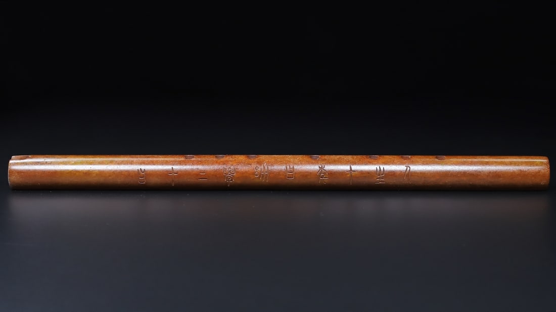 A Rare White Jade Inscription Flute: A Rare White Jade Inscription Flute,Qing Dynasty,China,Size:14.3inx0.9in,Weight:283g白玉铭文笛子,中国清代,Size:36.3cmx2.3cm,Weight:283g