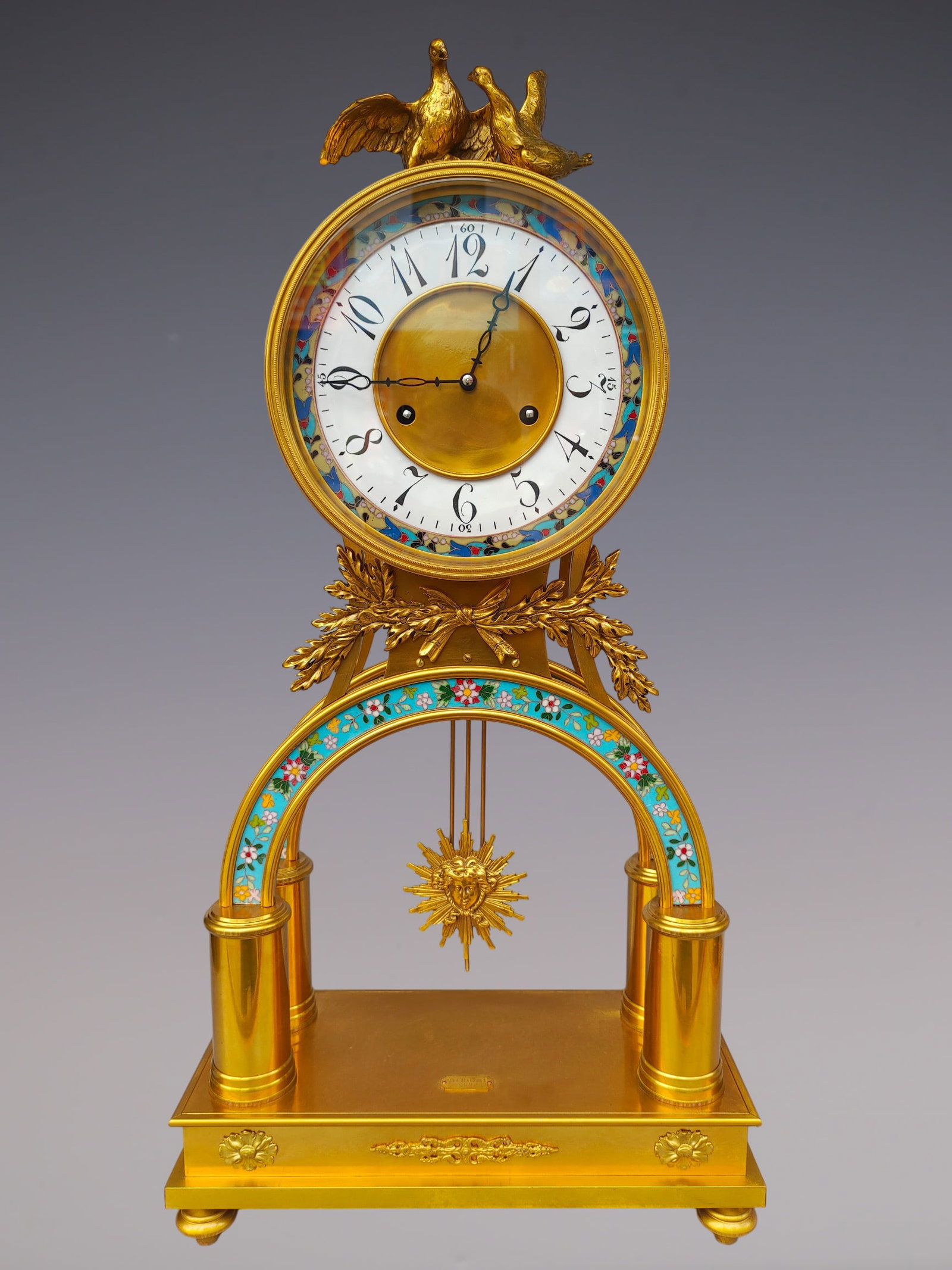 An Exquisite Gilt Bronze Lotus Pattern Clock: An Exquisite Gilt Bronze Lotus Pattern Clock Size:29.5inx15inx7.9in铜鎏金缠枝莲纹钟表 Size:75cmx38cmx20cm