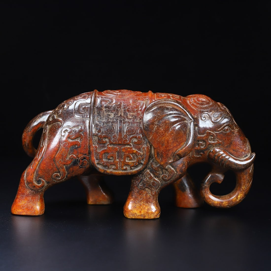 An Exquisite White Jade Beast-Face Pattern Elephant Ornament (1 of 10)