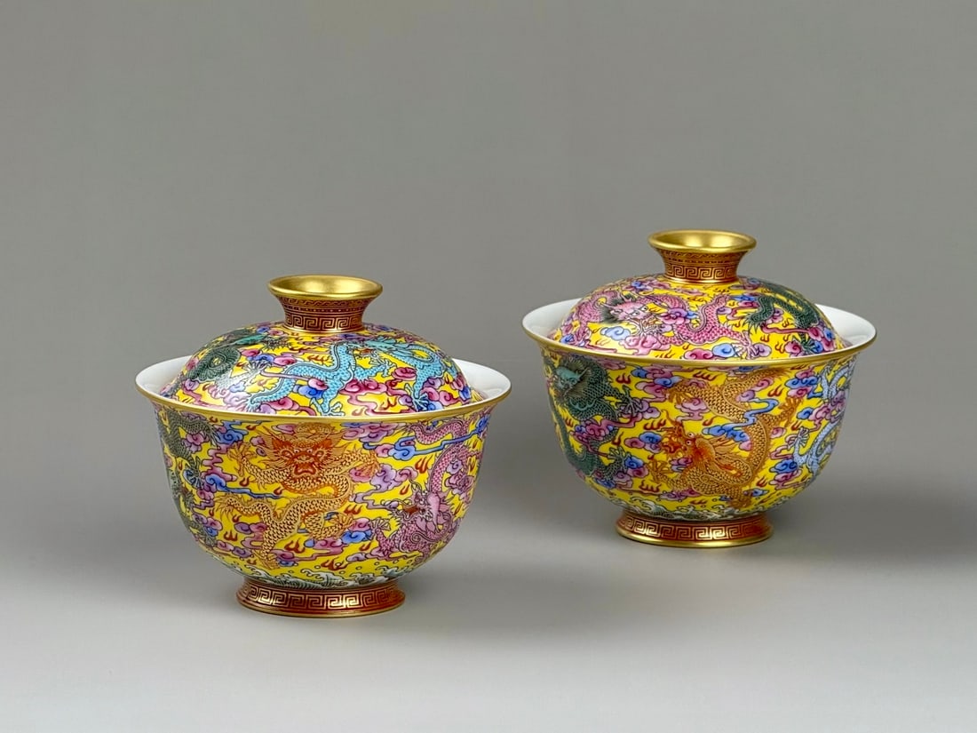 A Pair of Exquisite Yellow Ground Famille-Rose Painted Gold Auspicious Cloud and Dragon Pattern: A Pair of Exquisite Yellow Ground Famille-Rose Painted Gold Auspicious Cloud and Dragon Pattern Cover Bowls,Qing Dynasty,China,Qianlong Four-character Mark,Size:3.5inx3inx1.6in一对黄