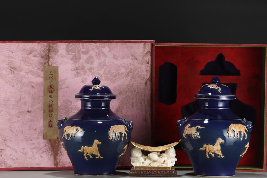 An Exquisite Ji Blue Glazed Horse Pattern Double-Ears Jar: An Exquisite Ji Blue Glazed Horse Pattern Double-Ears Jar Yuan Dynasty, China Size:17.7inx13.6in霁蓝浮雕八俊狗头盖罐 中国元