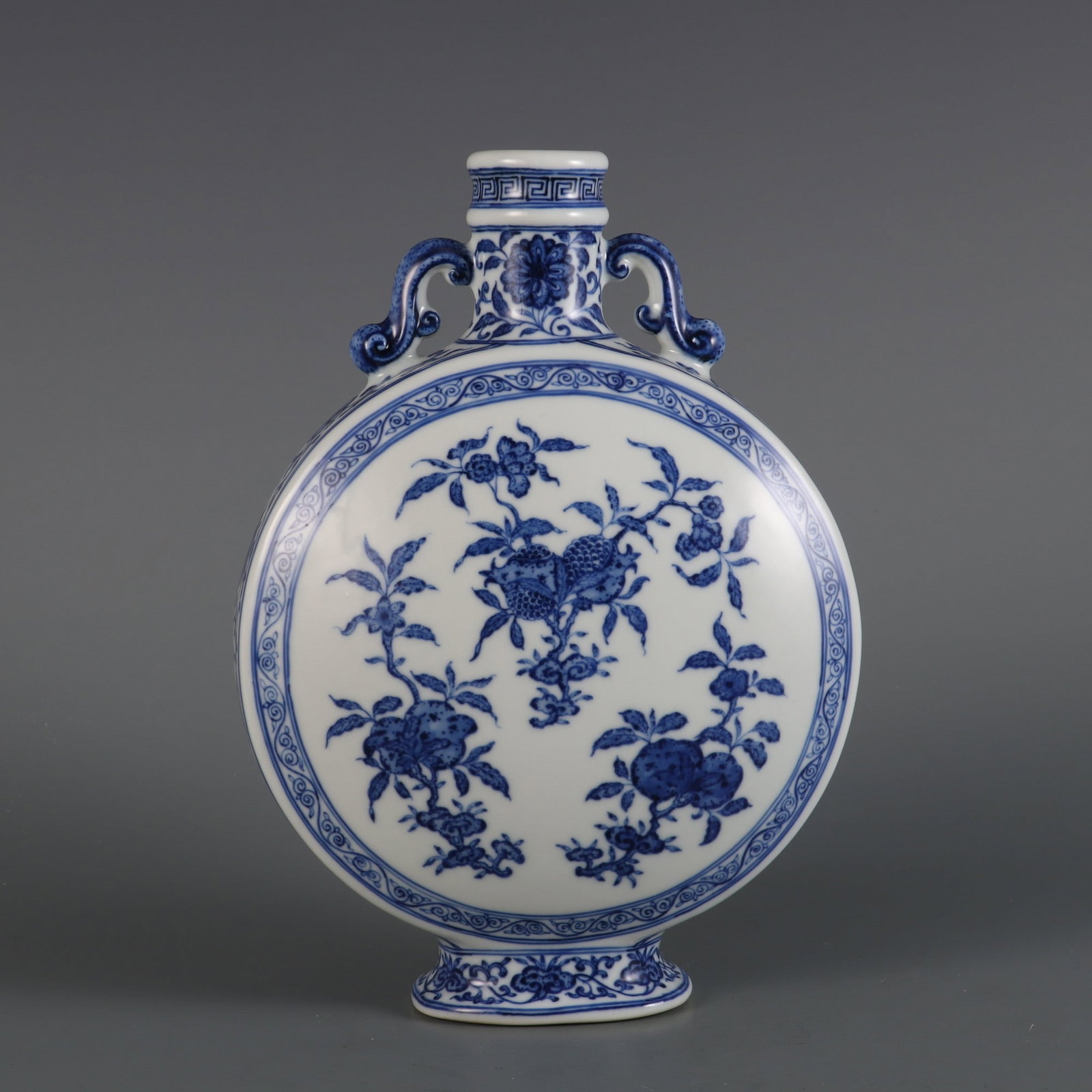 An Exquisite Blue and White Flower and Fruit Pattern Lotus Pattern Double-Ears Vase: An Exquisite Blue and White Flower and Fruit Pattern Lotus Pattern Double-Ears Vase Qing Dynasty, China Qianlong Six-character MarkSize:9.6inx6.7in青花花果纹缠ĉ