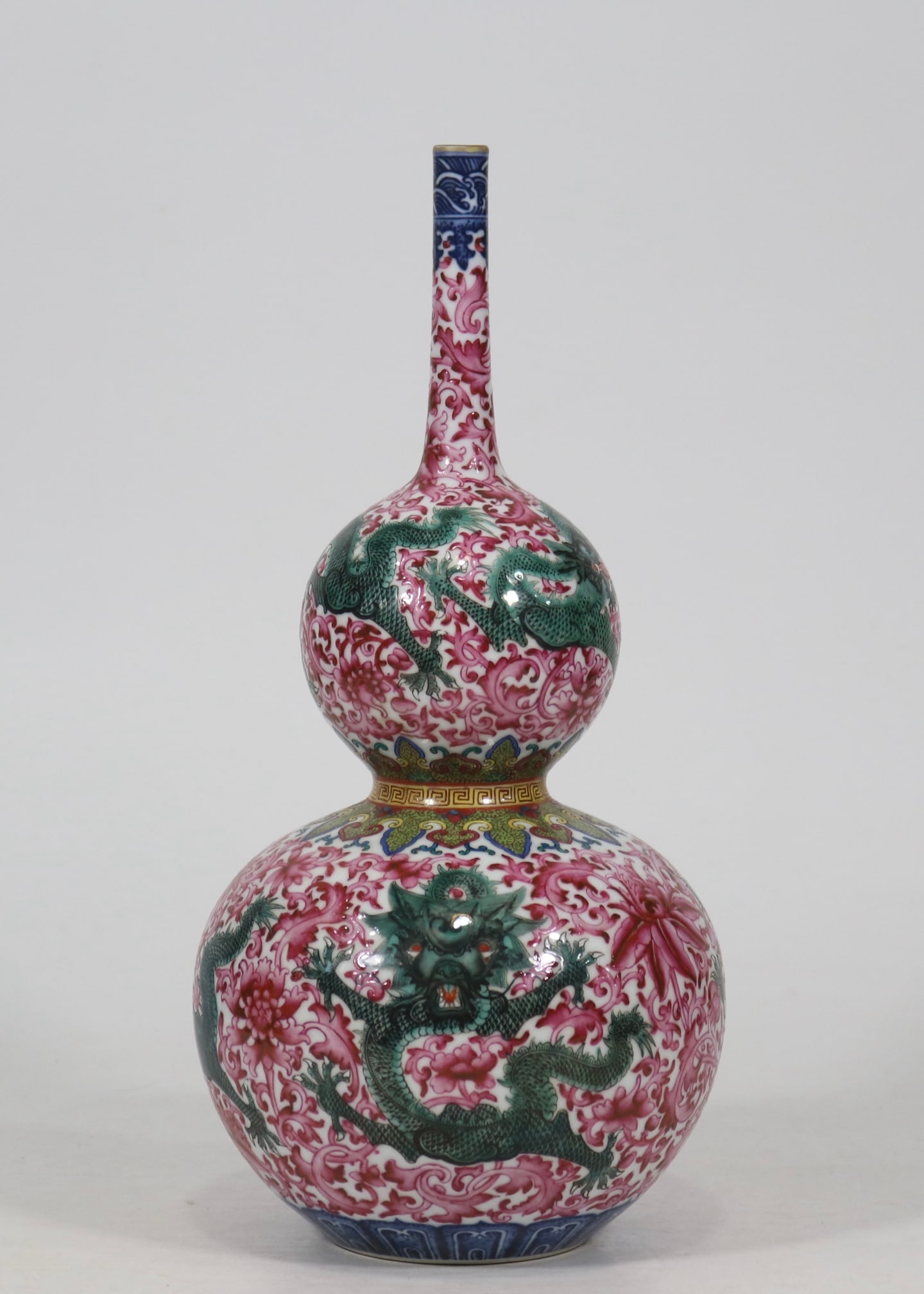 A Rare Blue and White Ruby Red-Glazed Famille-Rose Lotus and Dragon Pattern Gourd-Shaped Vase: A Rare Blue and White Ruby Red-Glazed Famille-Rose Lotus and Dragon Pattern Gourd-Shaped Vase,Qing Dynasty,China,Yongzheng Six-character Mark,Size:12inx5.4in青花胭脂红