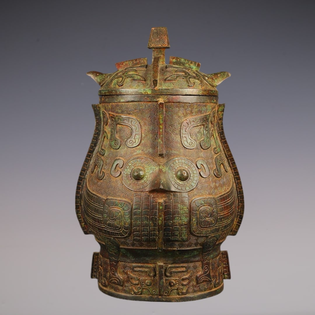 An Archaic Bronze Beast-Face Pattern Vase,With Inscription (1 of 9)