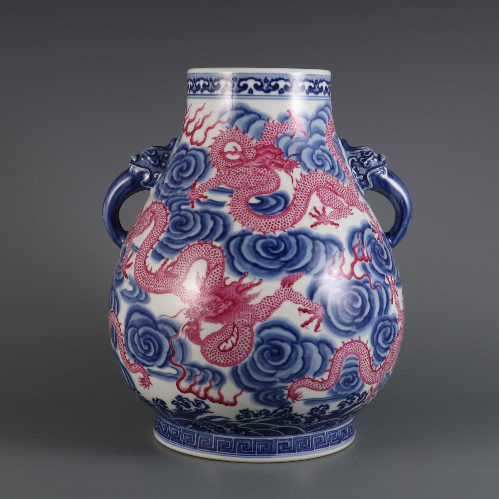 A Rare Blue and White Ruby red-Glazed Dragon Pattern Seawater Pattern Double-Ears Vase: A Rare Blue and White Ruby red-Glazed Dragon Pattern Seawater Pattern Double-Ears Vase Qing Dynasty, China Qianlong Six-character MarkSize:12.2inx9.1in青花宝石红釉&