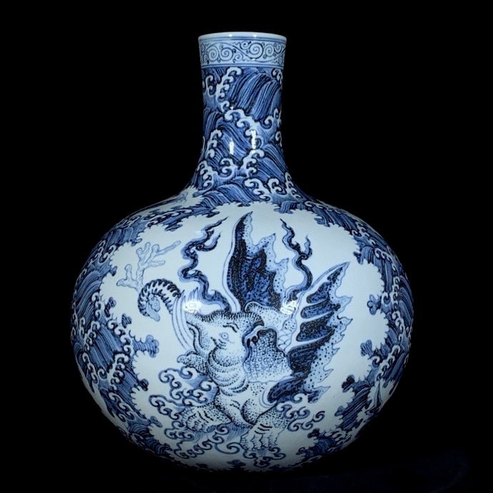 An Exquisite Blue and White Auspicious Beast Pattern Seawater Pattern Vase: An Exquisite Blue and White Auspicious Beast Pattern Seawater Pattern Vase Ming Dynasty, China Xuande Four-character Mark Size:16.5inx13.8in青花海怪纹天球