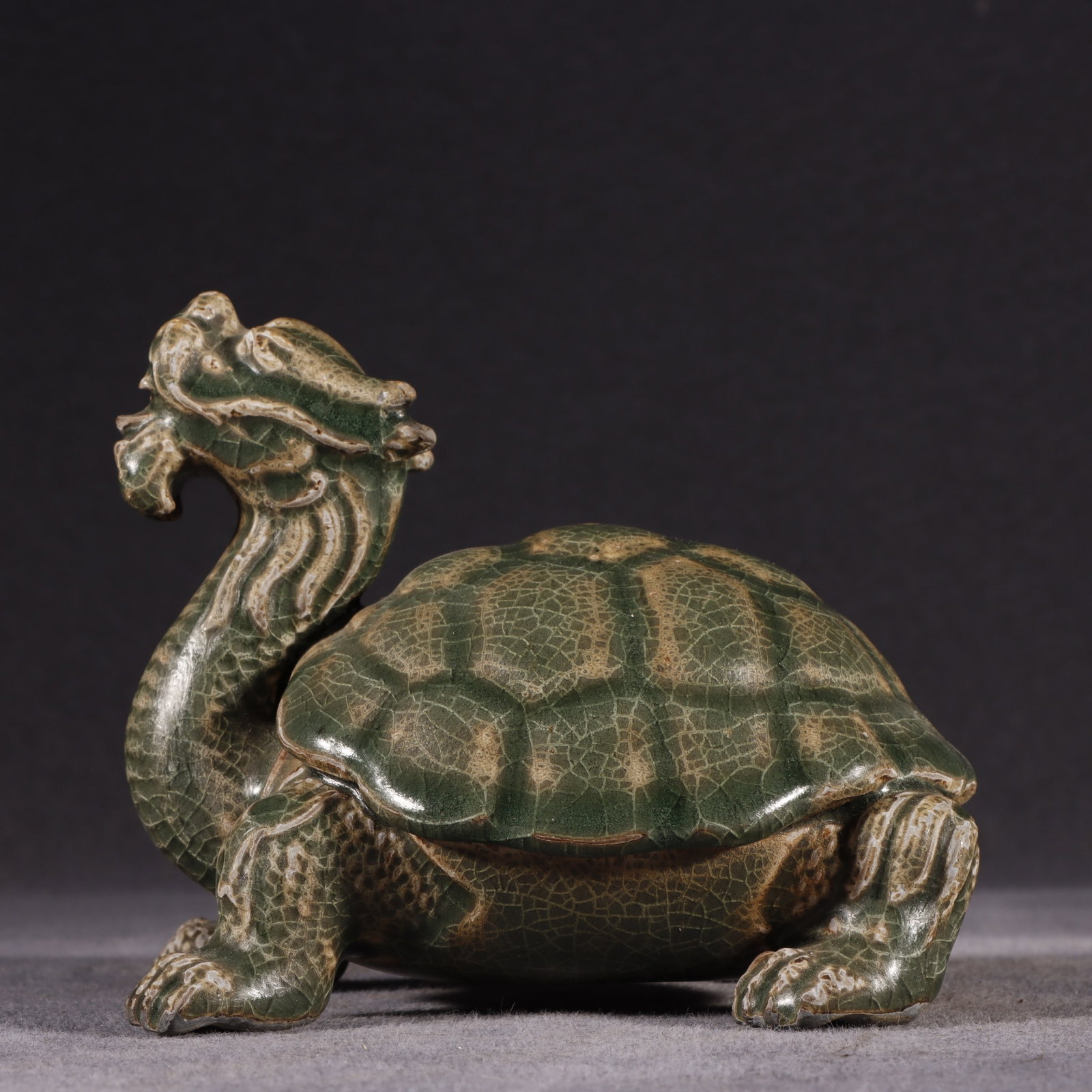 An Exquisite Mei yao Auspicious Beast Ornament: An Exquisite Mei yao Auspicious Beast Ornament Song Dynasty, China Size:3.9inx5.1in梅窑神兽摆件 中国宋代 Size:10cmx13cm