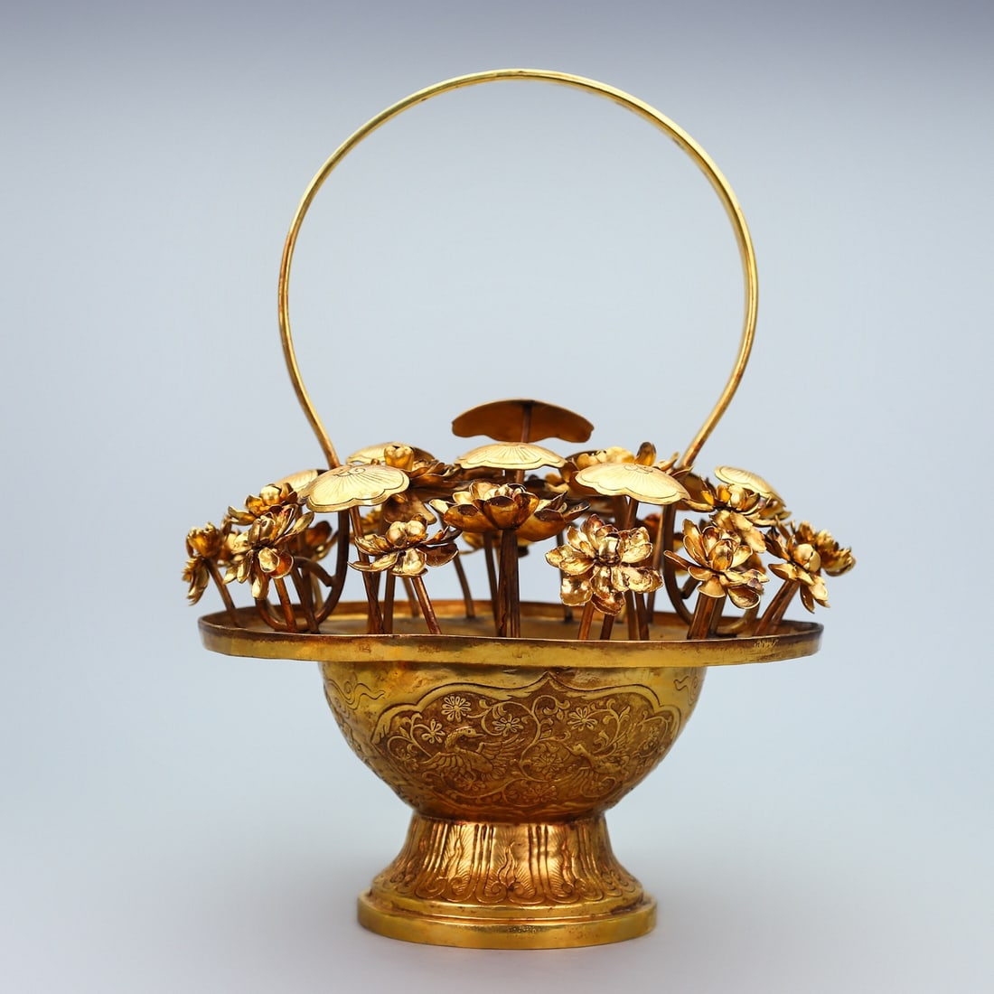 A Rare Gilt Bronze Lotus and Phoenix Pattern Flower Basket: A Rare Gilt Bronze Lotus and Phoenix Pattern Flower Basket,Qing Dynasty,China,Qianlong Four-character Mark,Size:14.2inx11.8in,Weight:2965g铜镀金缠枝莲凤ಬ