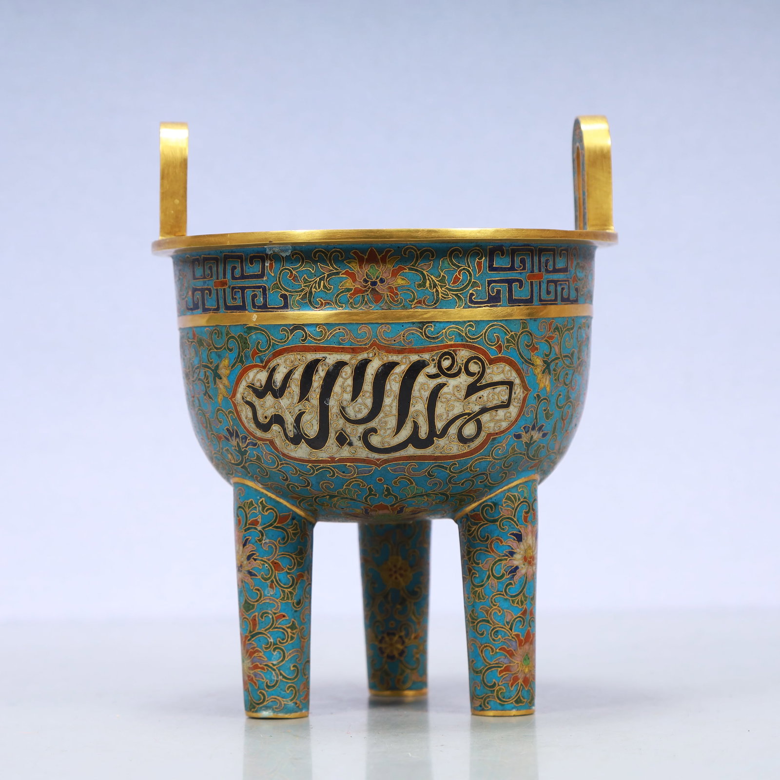 A Exquisite Cloisonne Lotus Pattern Double-Ears and Tripod Censer: A Exquisite Cloisonne Lotus Pattern Double-Ears and Tripod Censer Ming Dynasty, China ????????Size:6.3inx8.1in Weight:1300g景泰蓝缠枝莲纹双耳Ç