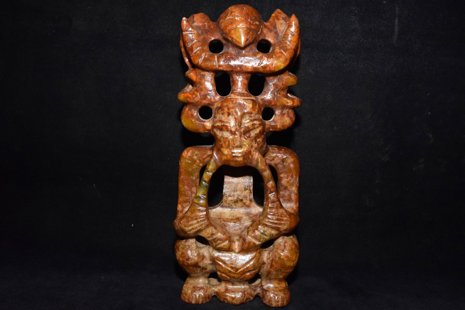An Exquisite Hemo Jade Sun God Ornament: An Exquisite Hemo Jade Sun God Ornament,Hongshan Culture,Size:11.6inx5.9in,Weight:2990g河磨玉太阳神摆件，红山文化，S