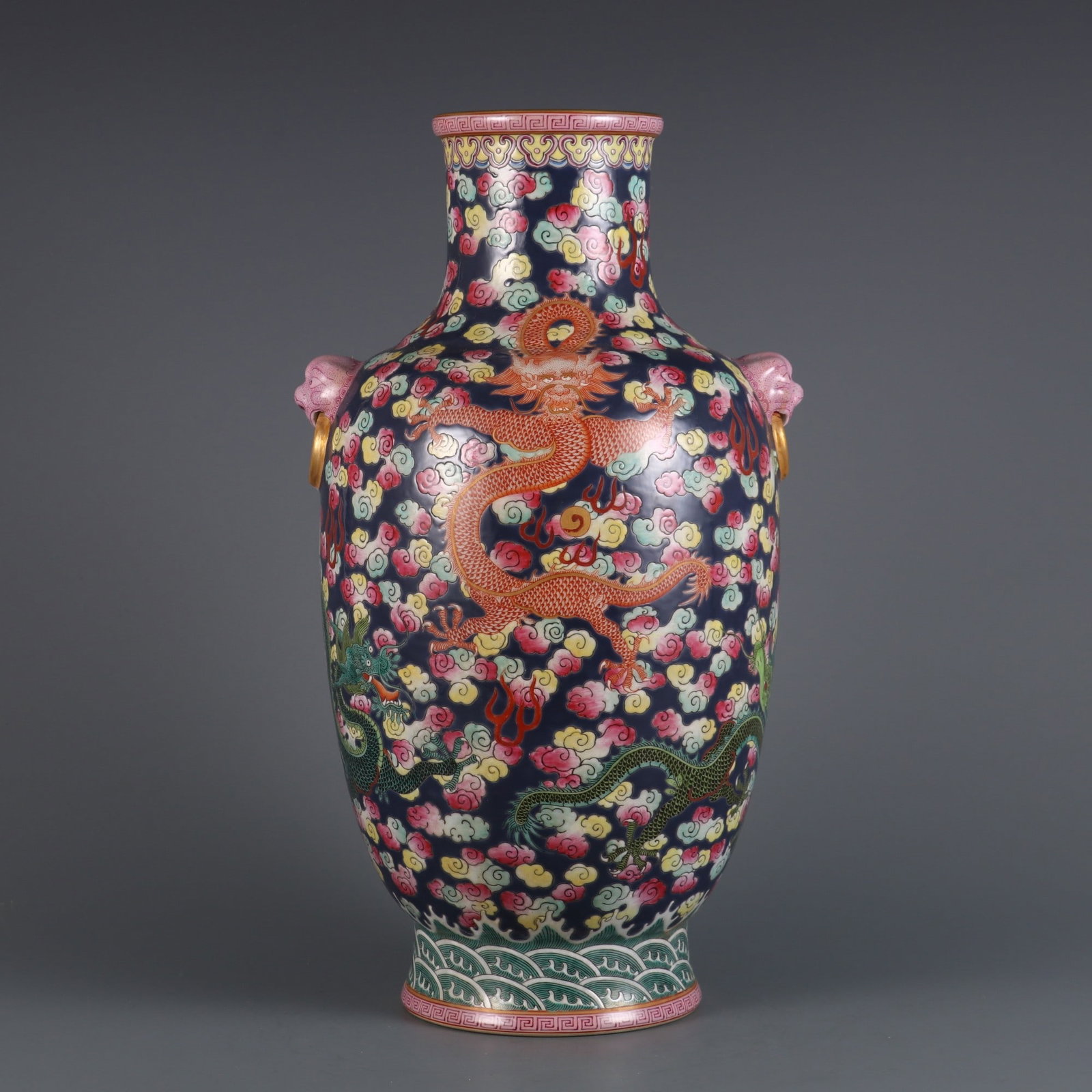 A Rare Famille-Rose Dragon Pattern Seawater Pattern Double-Ears Vase: A Rare Famille-Rose Dragon Pattern Seawater Pattern Double-Ears Vase Qing Dynasty, China Qianlong Six-character