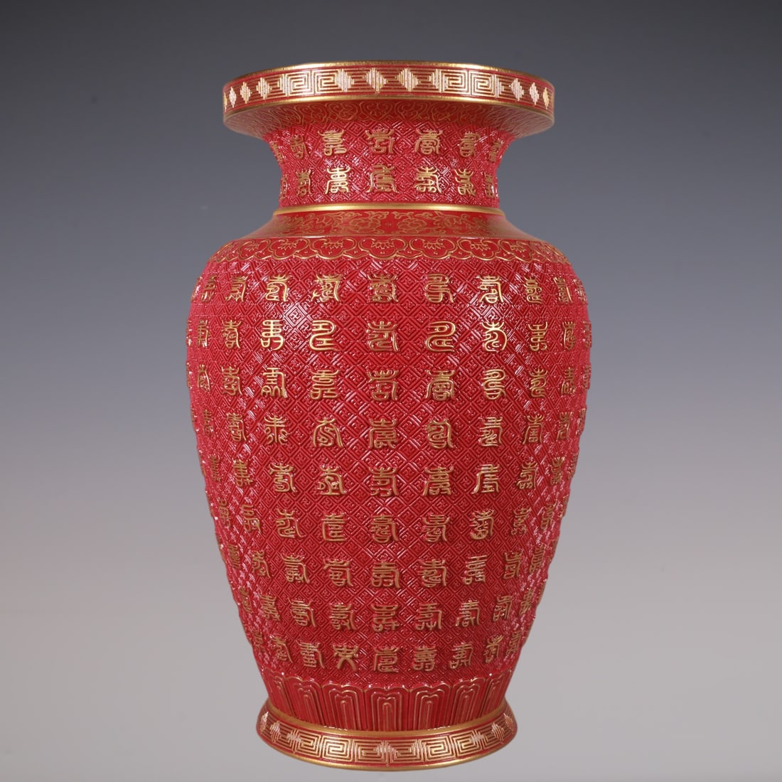 An Exquisite Ruby Red-Glazed Painted Gold Vase: An Exquisite Ruby Red-Glazed Painted Gold Vase Qing Dynasty, China Qianlong Six-character Mark Size:11.8inx7.5in胭脂红雕刻描金万寿尊 中