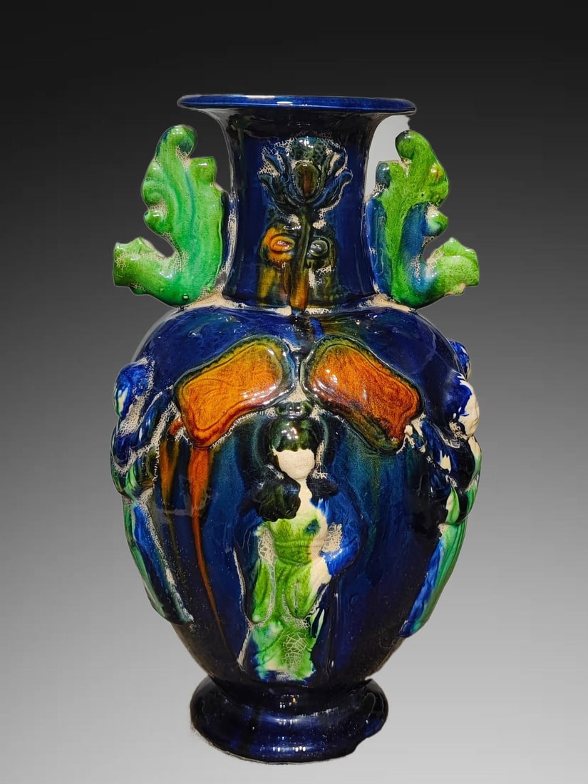 An Exquisite Tang Tri-Color Glazed Pottery Figures Pattern Phoenix-Ears Vase: An Exquisite Tang Tri-Color Glazed Pottery Figures Pattern Phoenix-Ears Vase,Tang Dynasty, China,Size:15inx8.7in 唐三彩人物纹凤耳瓶,中ࢲ