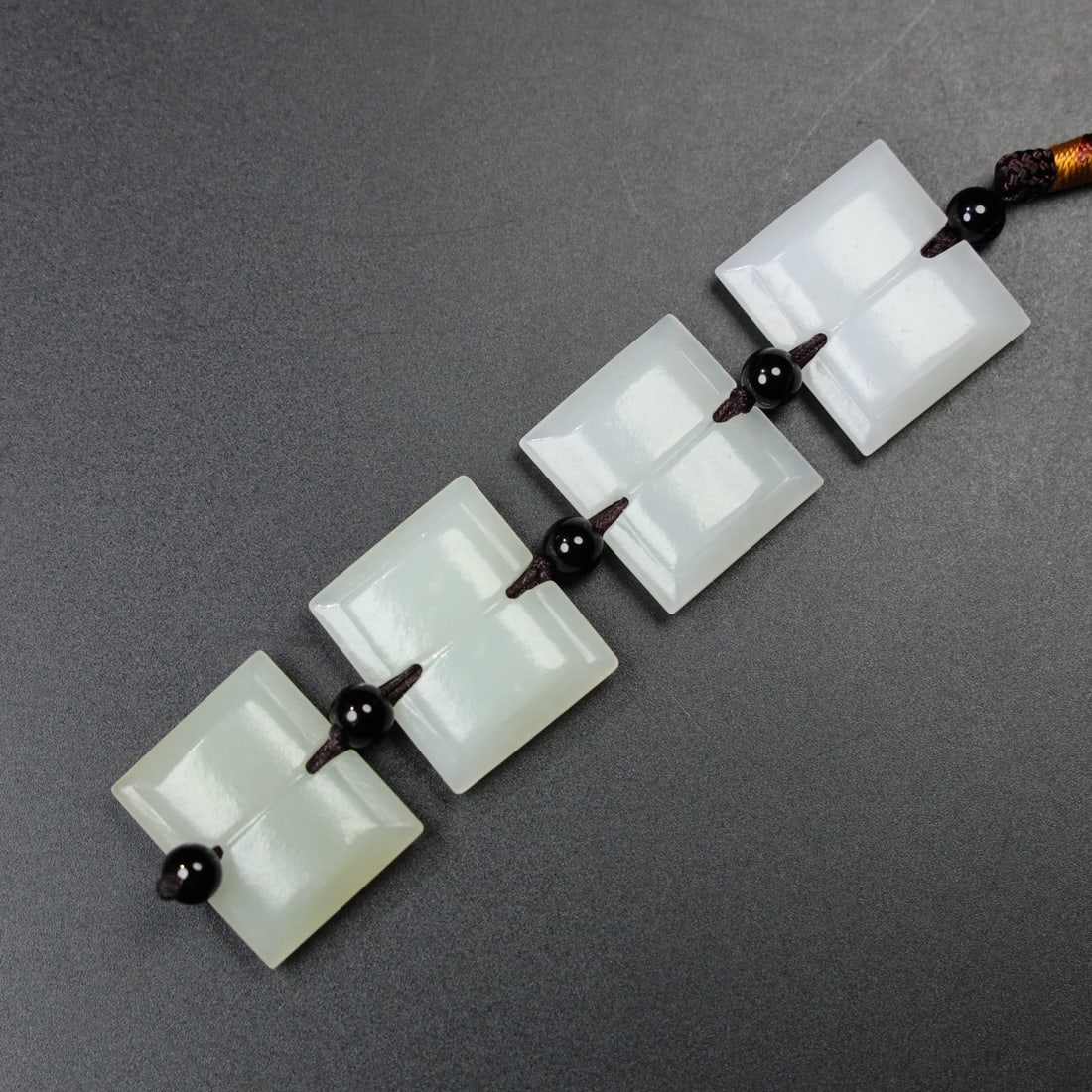 An Exquisite Hotan Jade I-Shaped pendant (1 of 7)