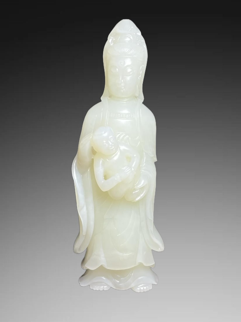 An Exquisite Hotan Jade Avalokitesvara Ornament: An Exquisite Hotan Jade Avalokitesvara Ornament,Qing Dynasty, China,Size:5.4inx1.4inx1.7in,Weight:246g 和田玉观音摆件,中国清代