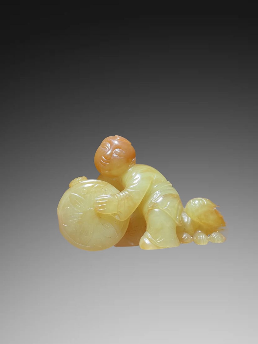 An Exquisite Hotan Yellow Jade Figures Ornament: An Exquisite Hotan Yellow Jade Figures Ornament,Qing Dynasty, China,Size:2.4inx1.7inx0.7in,Weight:49.2g