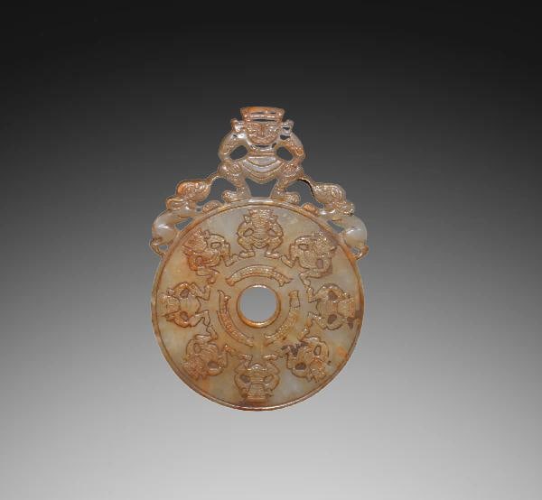 An Exquisite Hotan Jade Bi (1 of 4)
