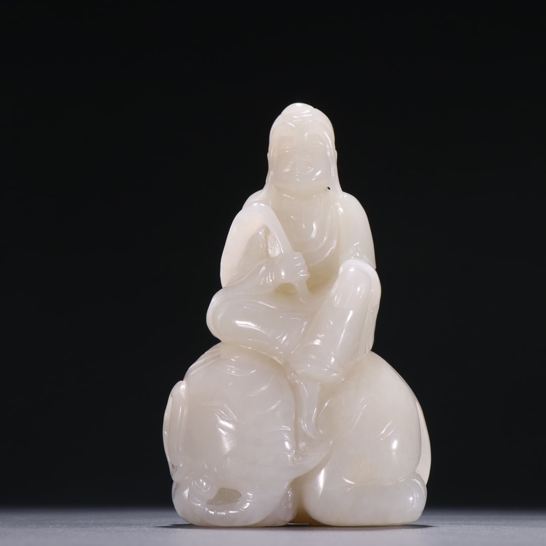 An Exquisite Hotan Jade Arhat Riding Elephant Ornament (1 of 9)
