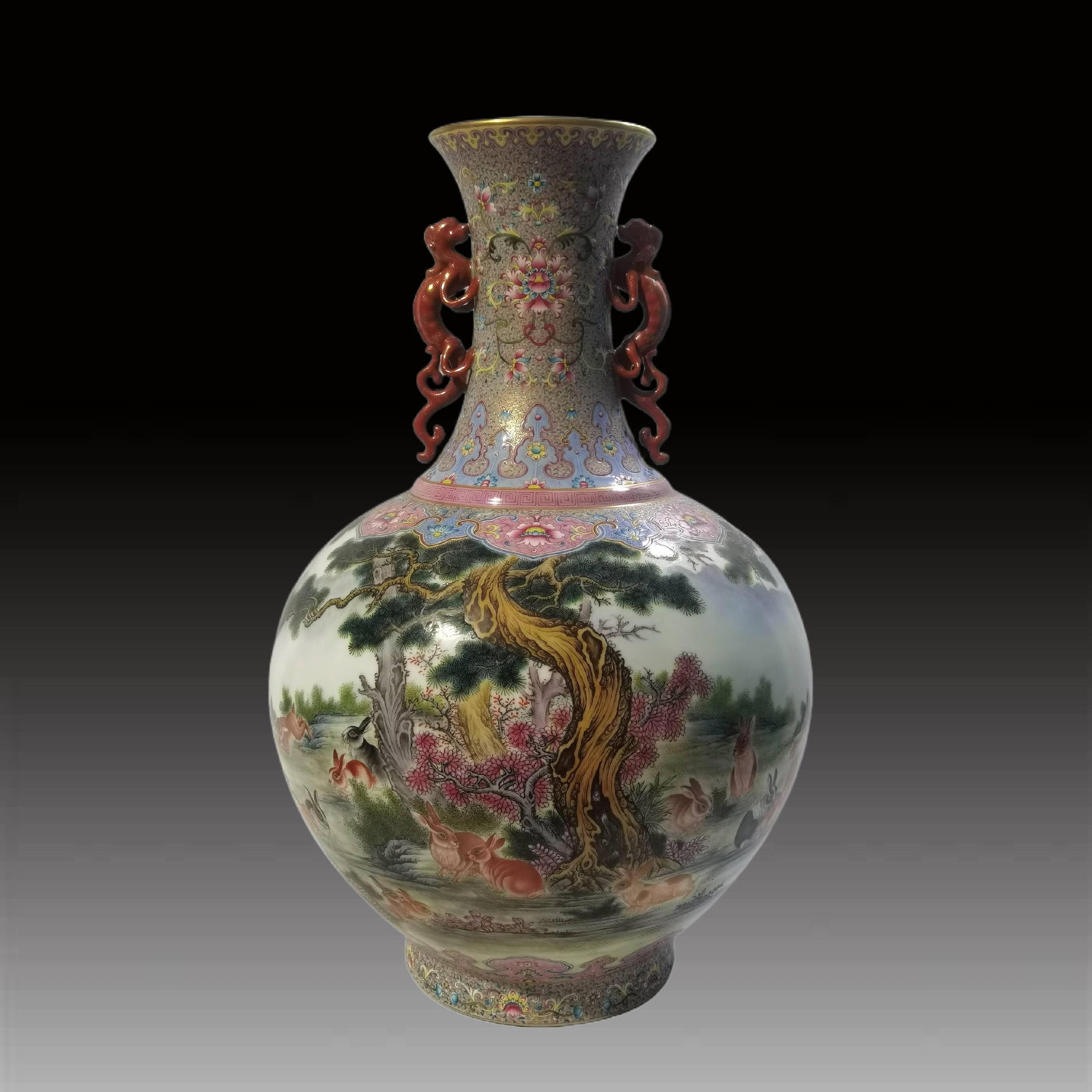 An Exquisite Enamel Rabbit Pattern Dragon-Ears Vase: An Exquisite Enamel Rabbit Pattern Dragon-Ears Vase,Qing Dynasty, China,Qianlong Four-character Mark,Size:20.5inx5.2inx14.2inx6.9in 珐琅彩兔纹龙耳瓶,