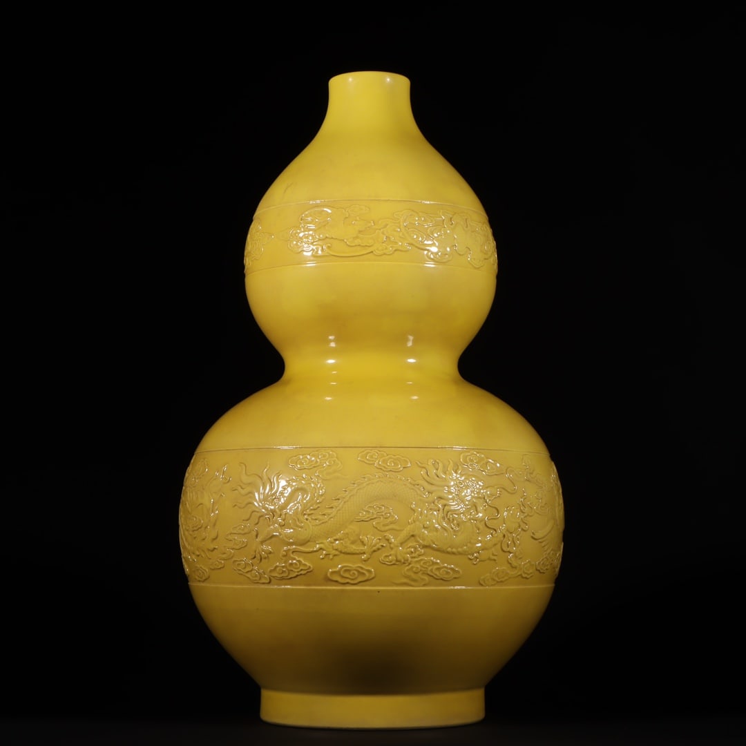An Exquisite Yellow Glazed Dragon Pattern Gourd Vase: An Exquisite Yellow Glazed Dragon Pattern Gourd Vase,Qing Dynasty, China,Qianlong Six-character Mark,Size:15.7inx2inx9.1inx5.4in 黄釉龙纹葫芦瓶,中ࢲ