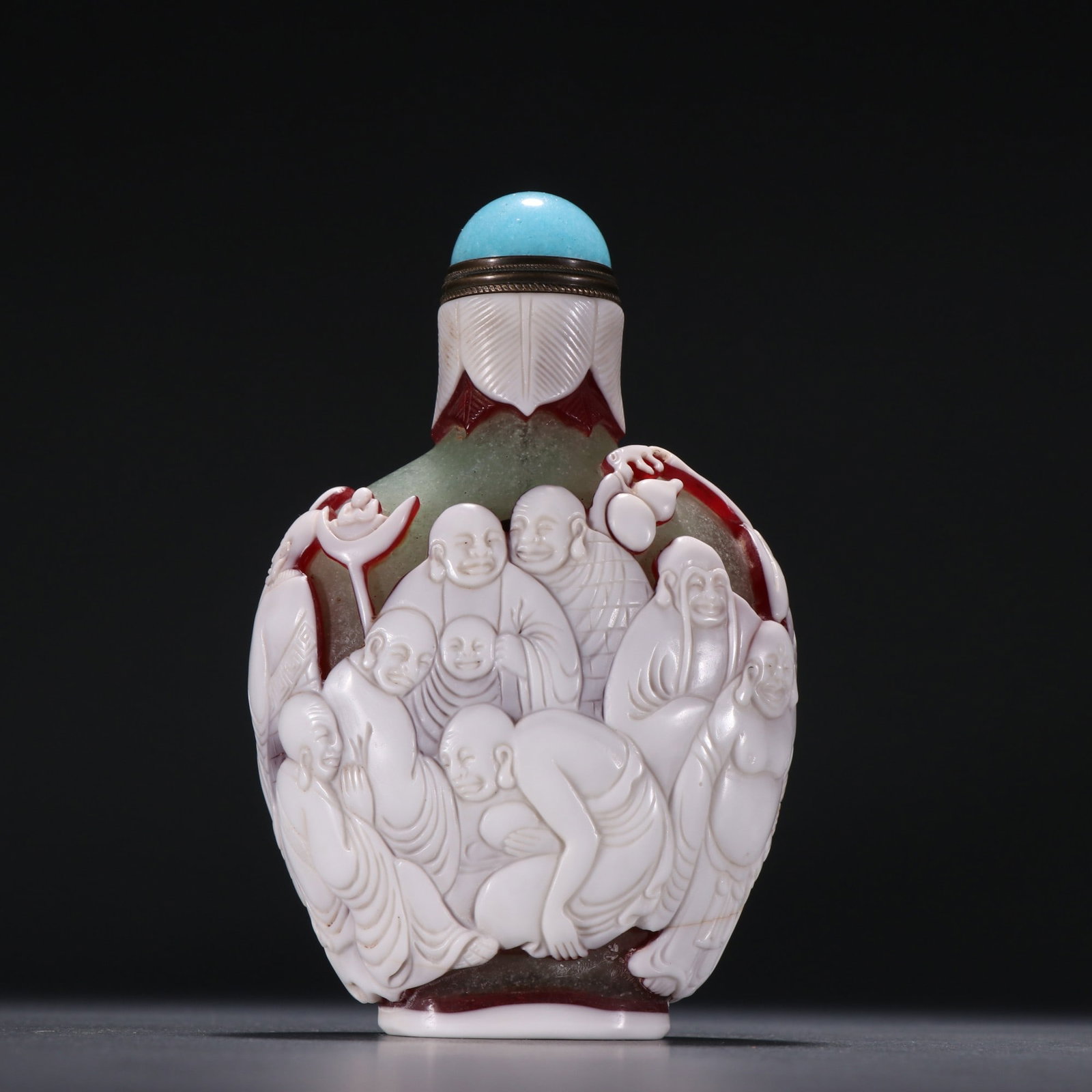An Exquisite Colored glaze Eighteen Arhat Snuff Bottle: An Exquisite Colored glaze Eighteen Arhat Snuff Bottle, Qing Dynasty, China,Size:4.5inx2.9in ,Weight:256g 琉璃十八罗汉鼻烟壶,