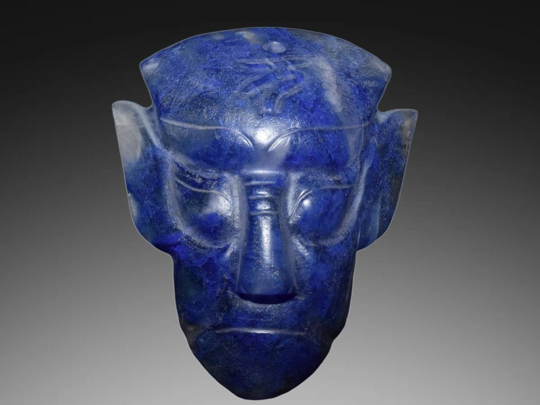 An Exquisite Hemoyu Jade Facial Mask: An Exquisite Hemoyu Jade Facial Mask,Ancient Time,China,Size:7.1inx4.8in,Weight:960g 河磨玉脸谱,远古时期