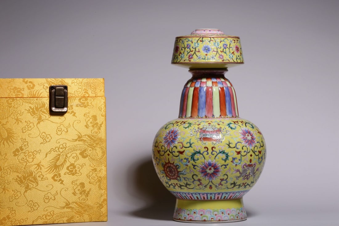 An Exquisite Yellow Glazed Lotus Pattern Ewer: An Exquisite Yellow Glazed Lotus Pattern Ewer,Qing Dynasty, China,Qianlong Six-character Mark,Size:10.5inx4in 黄釉缠枝莲纹壶,中国清代,