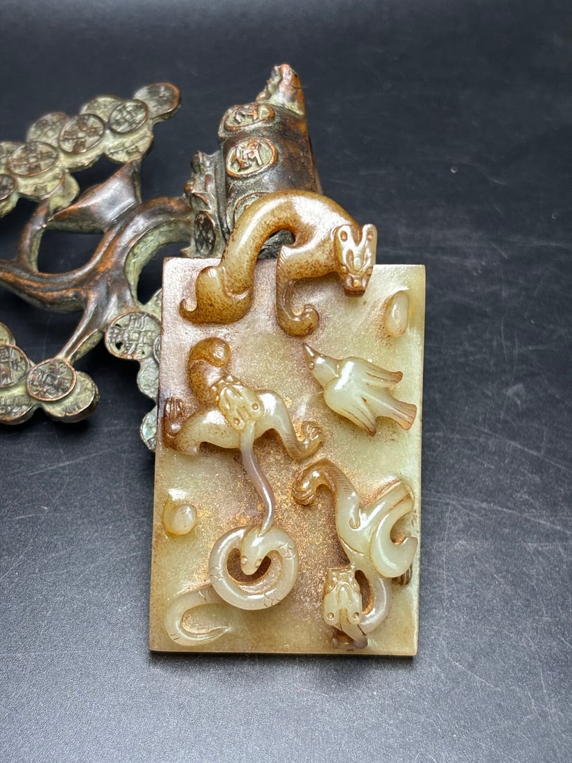 An Exquisite Hotan Jade Auspicious Beast Jade Pendant (1 of 7)
