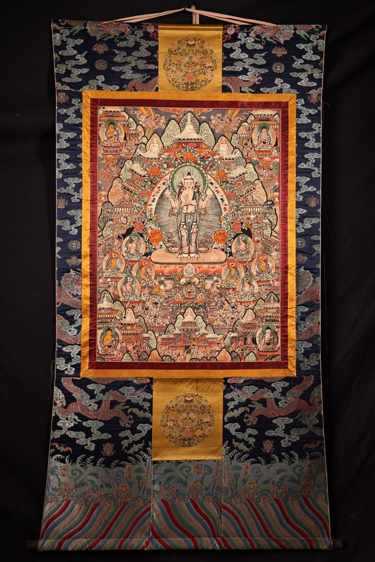 An Exquisite Four-arms Avalokitesvara Thangka: An Exquisite Four-arms Avalokitesvara Thangka,Ming Dynasty, China,Size:59.1inx31.5in(Whole),35inx23.6in(Leather Core) 四臂观音唐卡,中国明代