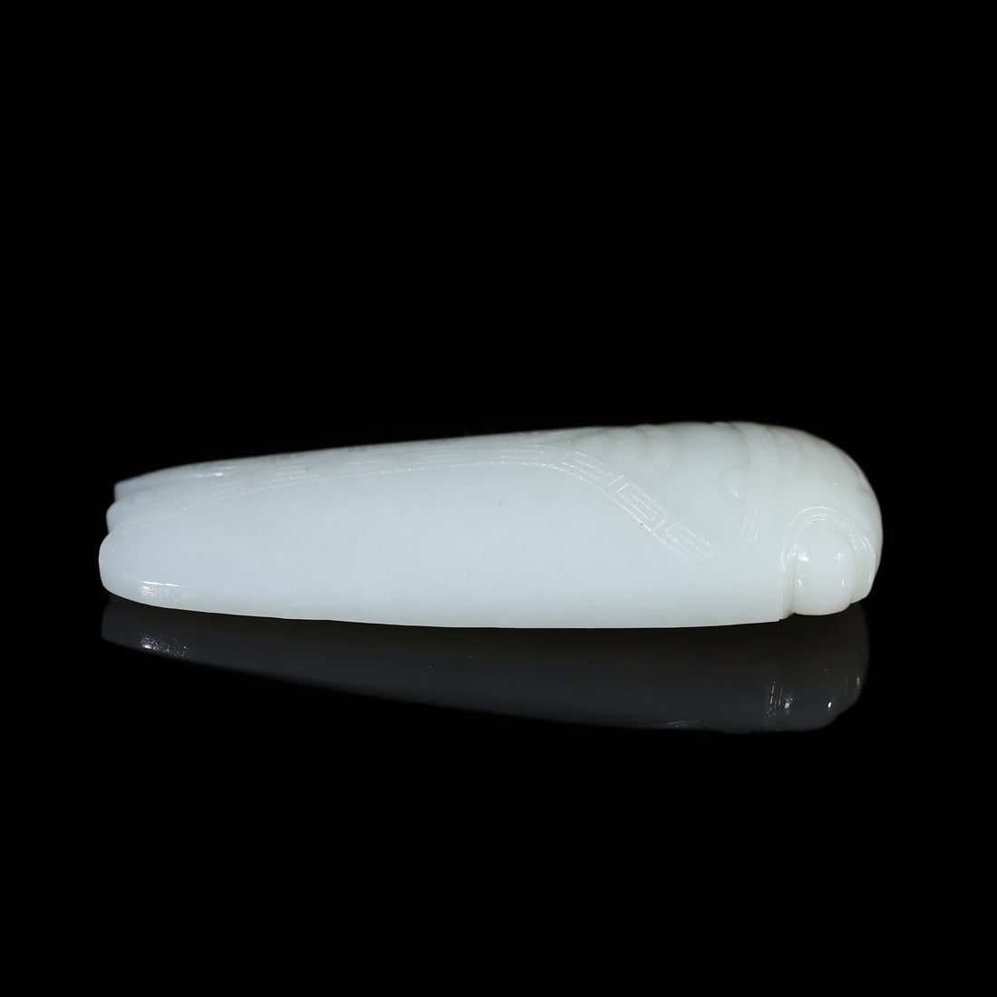 An Exquisite Hotan Jade Cicada Ornament: An Exquisite Hotan Jade Cicada Ornament,Qing Dynasty, China,Size:3.6inx1.5inx0.7in,Weight:104g 和田玉蝉摆件,中国清代