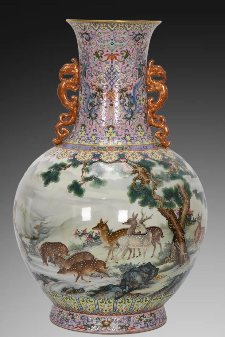 An Exquisite Enamel Pine and Deer Pattern Double-Ears Vase: An Exquisite Enamel Pine and Deer Pattern Double-Ears Vase,Qing Dynasty, China,Qianlong Six-character Mark,Size:24.1inx7.5inx15.4inx9.4in 珐琅彩松鹿纹双೑
