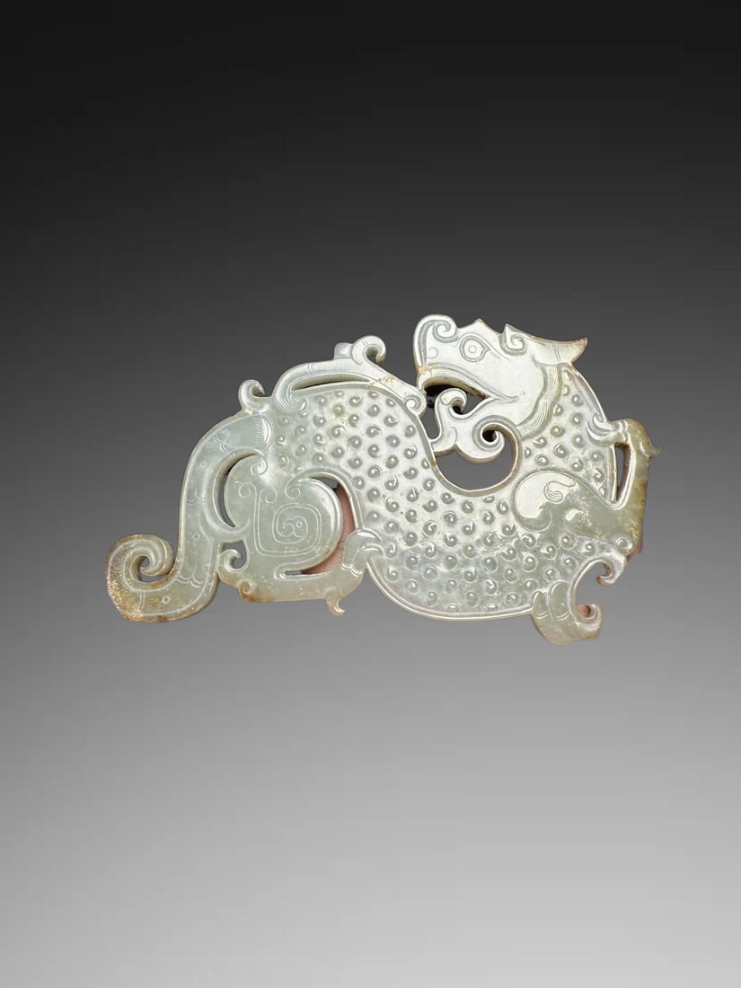 A pair of Exquisite Hotan Jade Dragon Pendant: A pair of Exquisite Hotan Jade Dragon Pendant,Han Dynasty, China,Size:4.3in,Weight:130g 一对和田玉龙佩,中国汉代